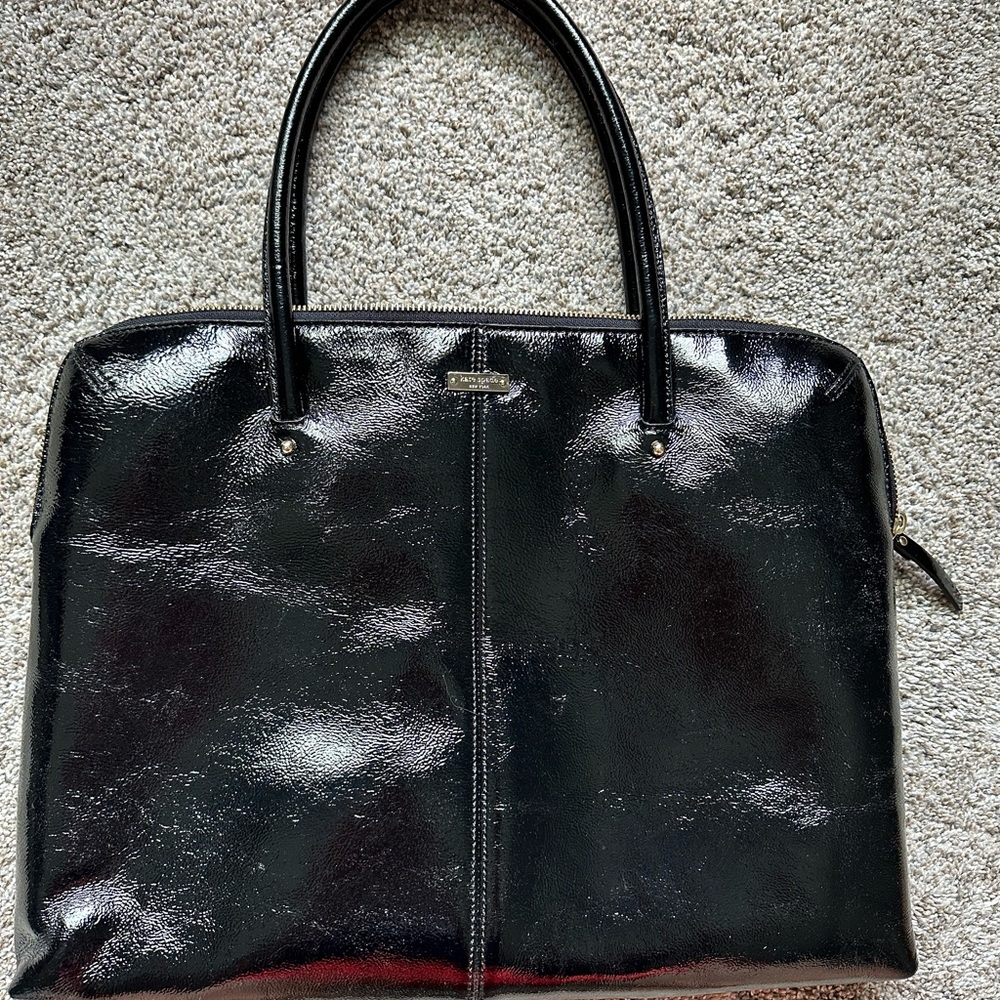 Kate Spade black bag some staining near zipper